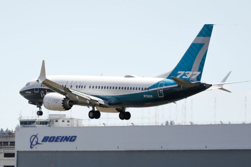 A Boeing 737 MAX jet lands following a Federal Aviation Administration (FAA) test flight at Boeing Field in Seattle, Washington, on June 29, 2020. A congressional report found a "disturbing pattern of technical miscalculations and troubling management misjudgments made by Boeing" with regard to the 737 Max.